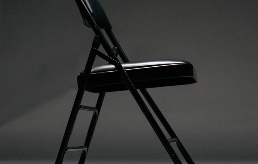 black chair in a dark room